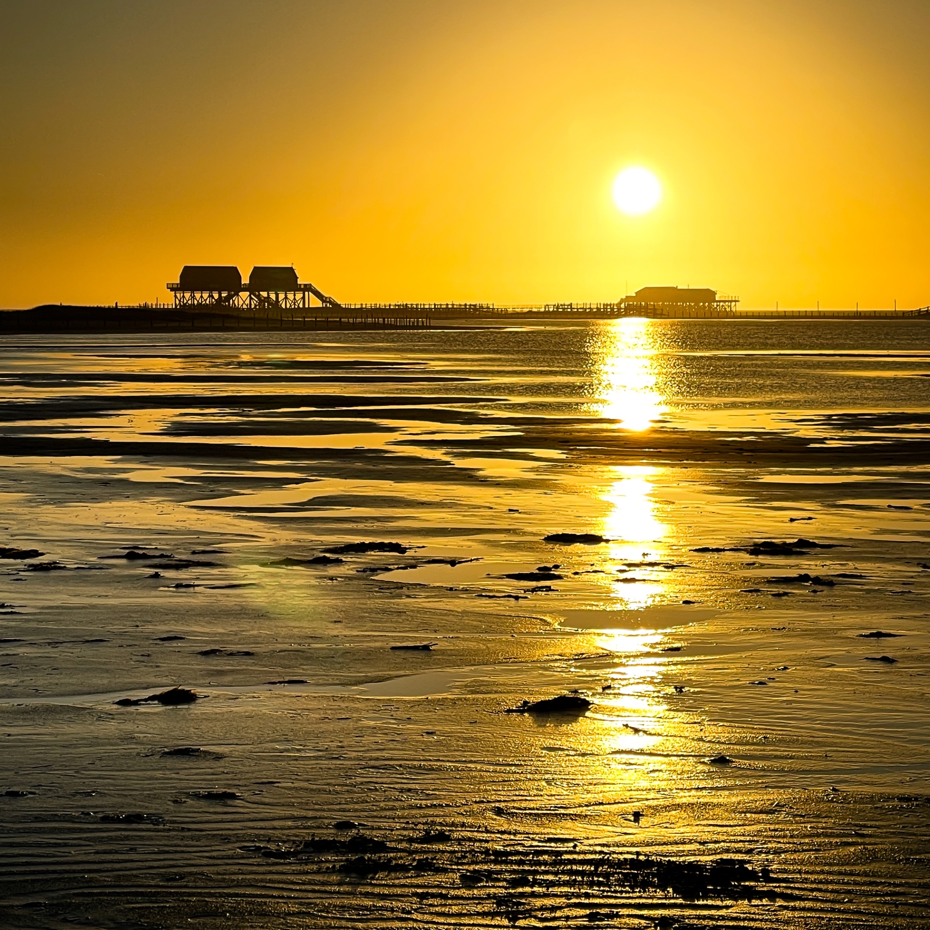 St. Peter-Ording auf Holz - Goldener Sonnenuntergang