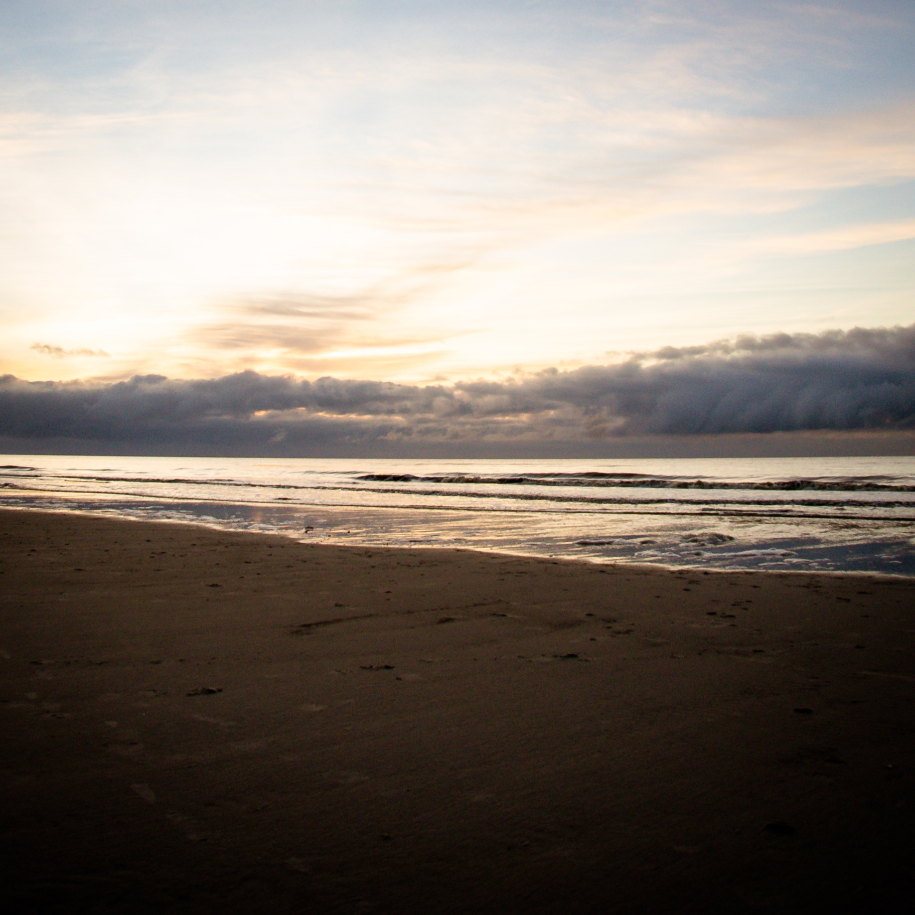 St. Peter-Ording auf Holz - Wellen im Morgenlicht
