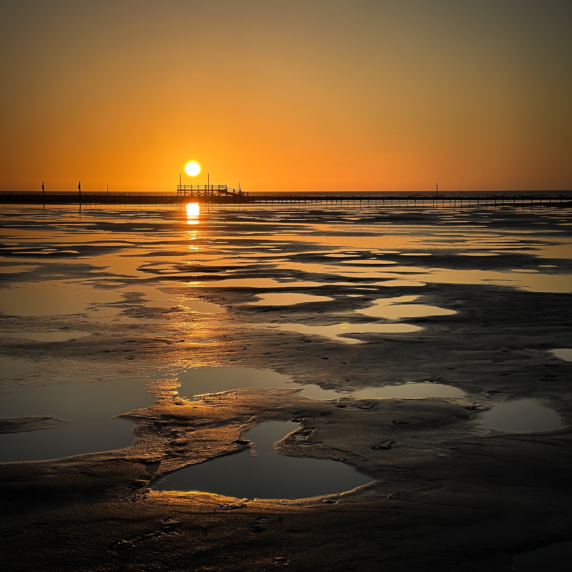 St. Peter-Ording auf Holz - Sonnenuntergang am Steg