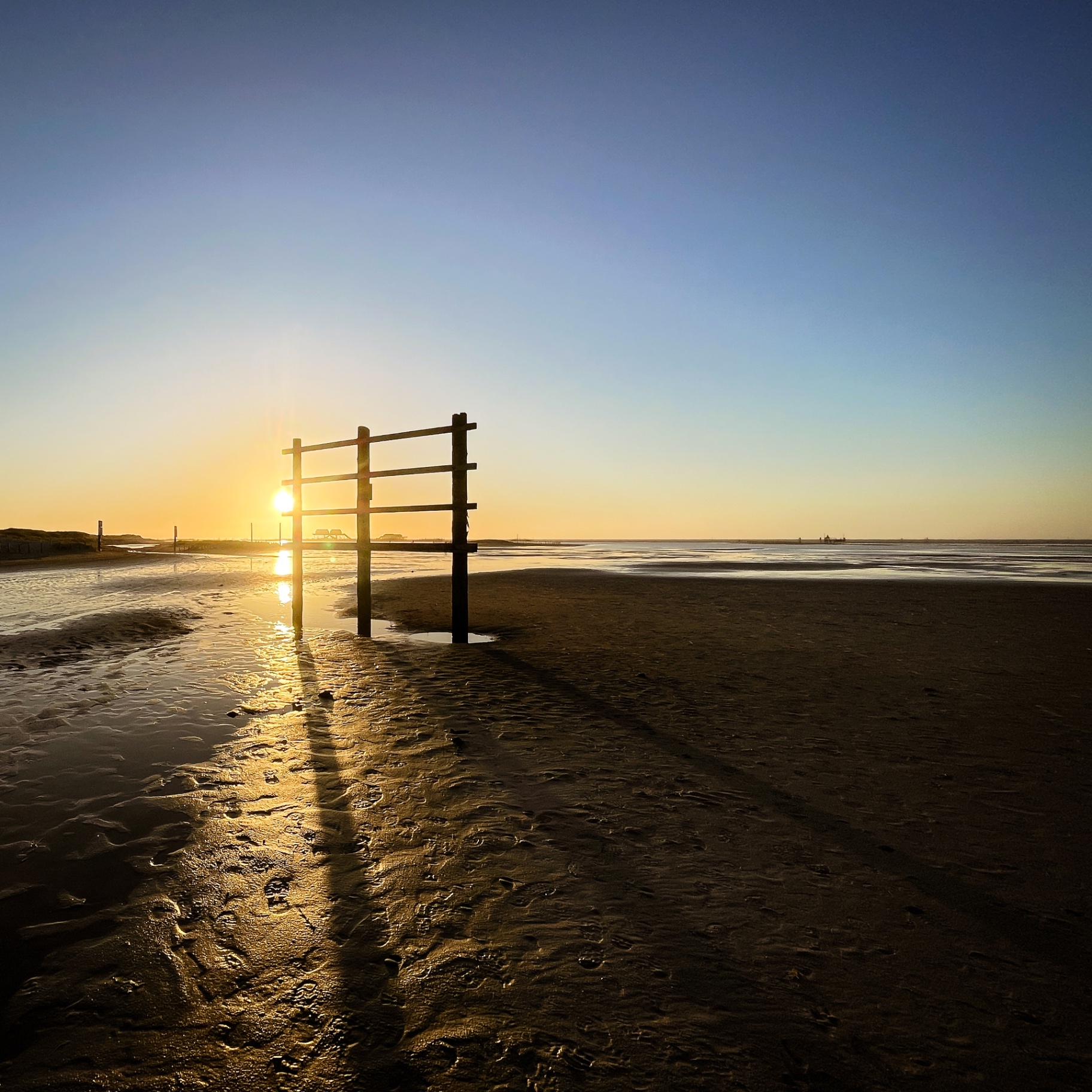 St. Peter-Ording auf Holz - Buhne im Gegenlicht