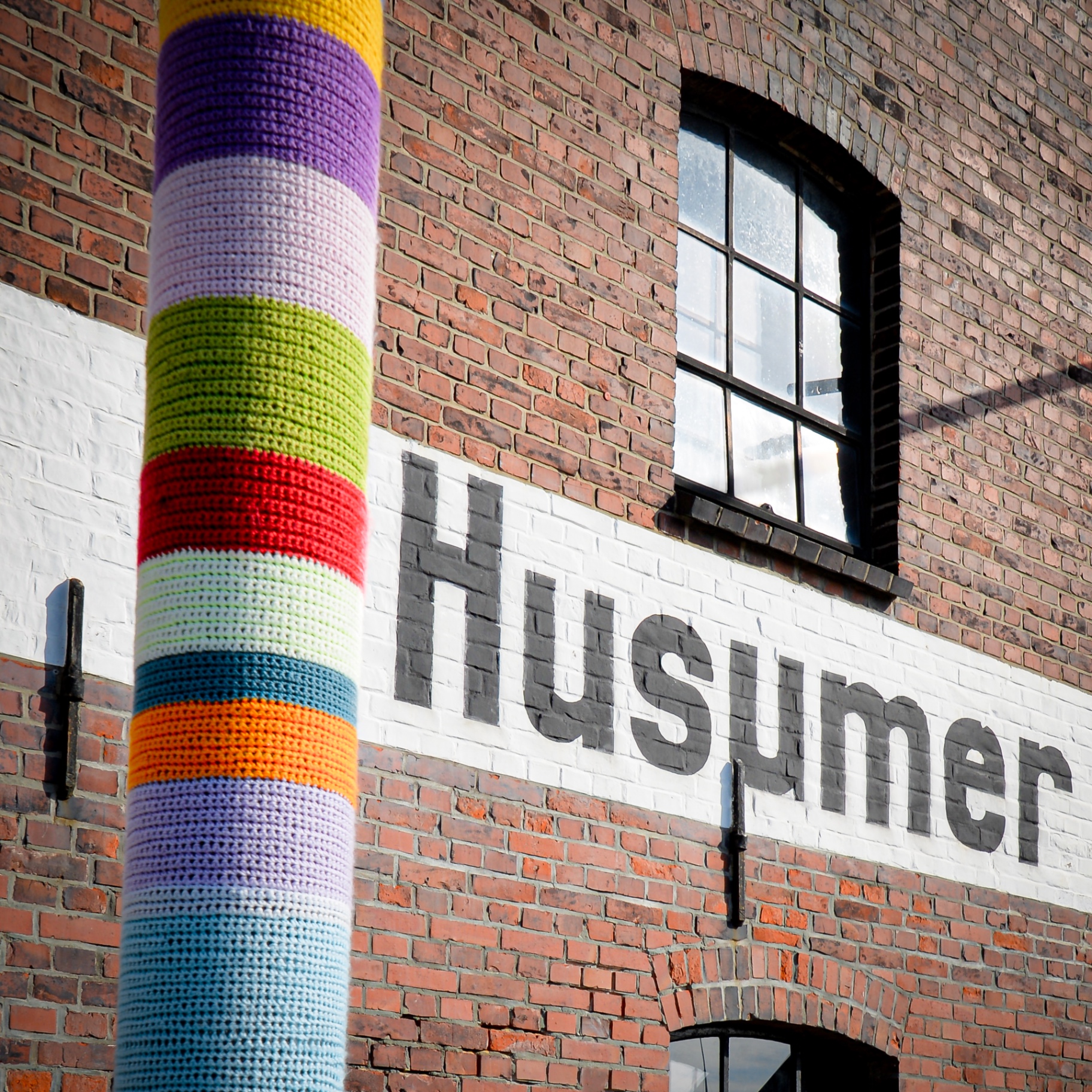 Husum auf Holz - Schriftzug